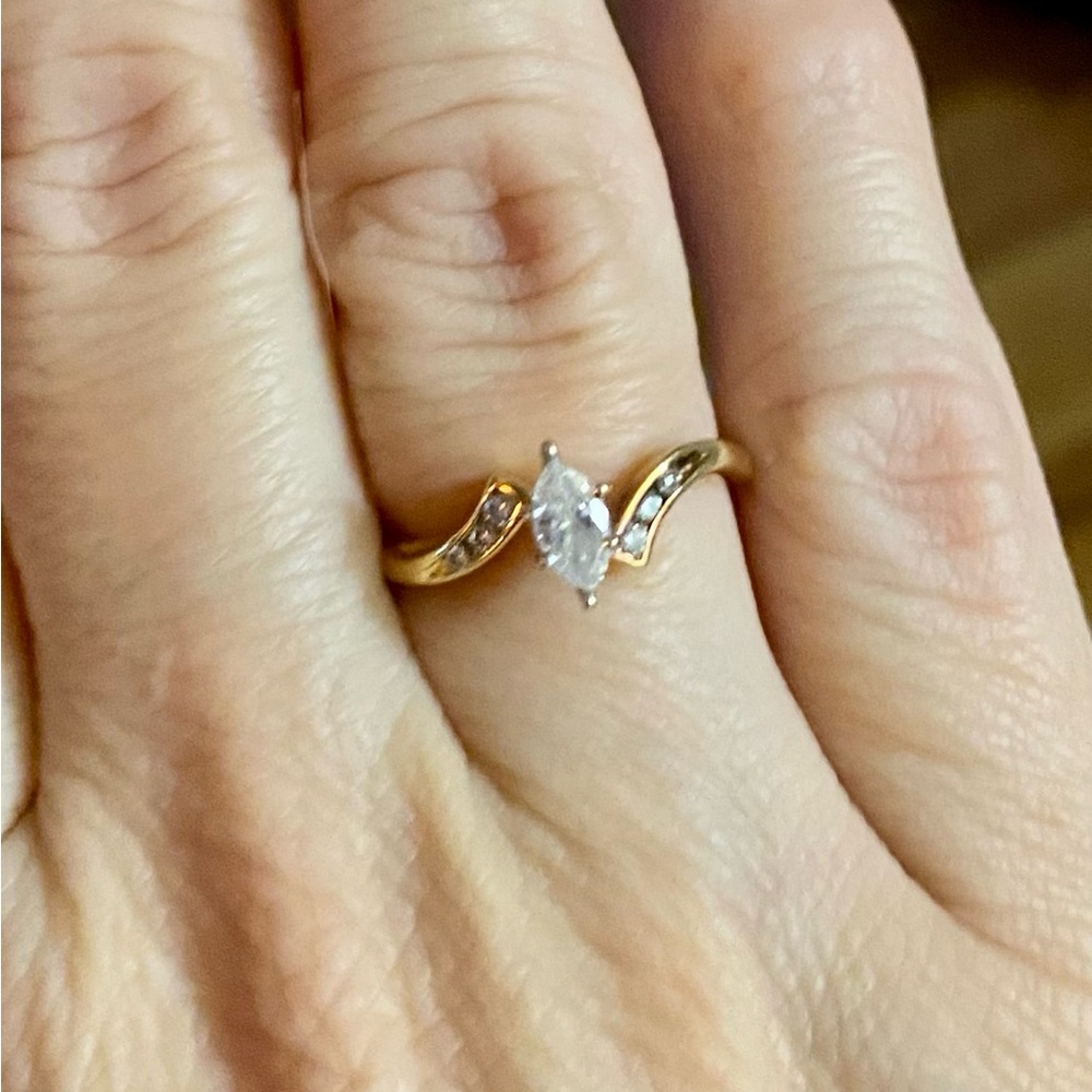 1/4 ct solitaire diamond ring. Real diamonds and 14K yellow gold. Ring size 7.